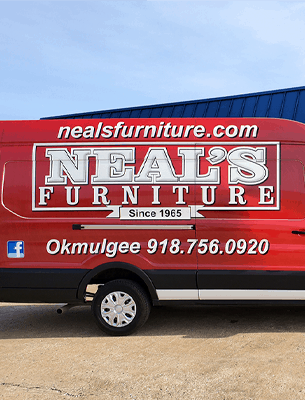 Neals furniture car wrap